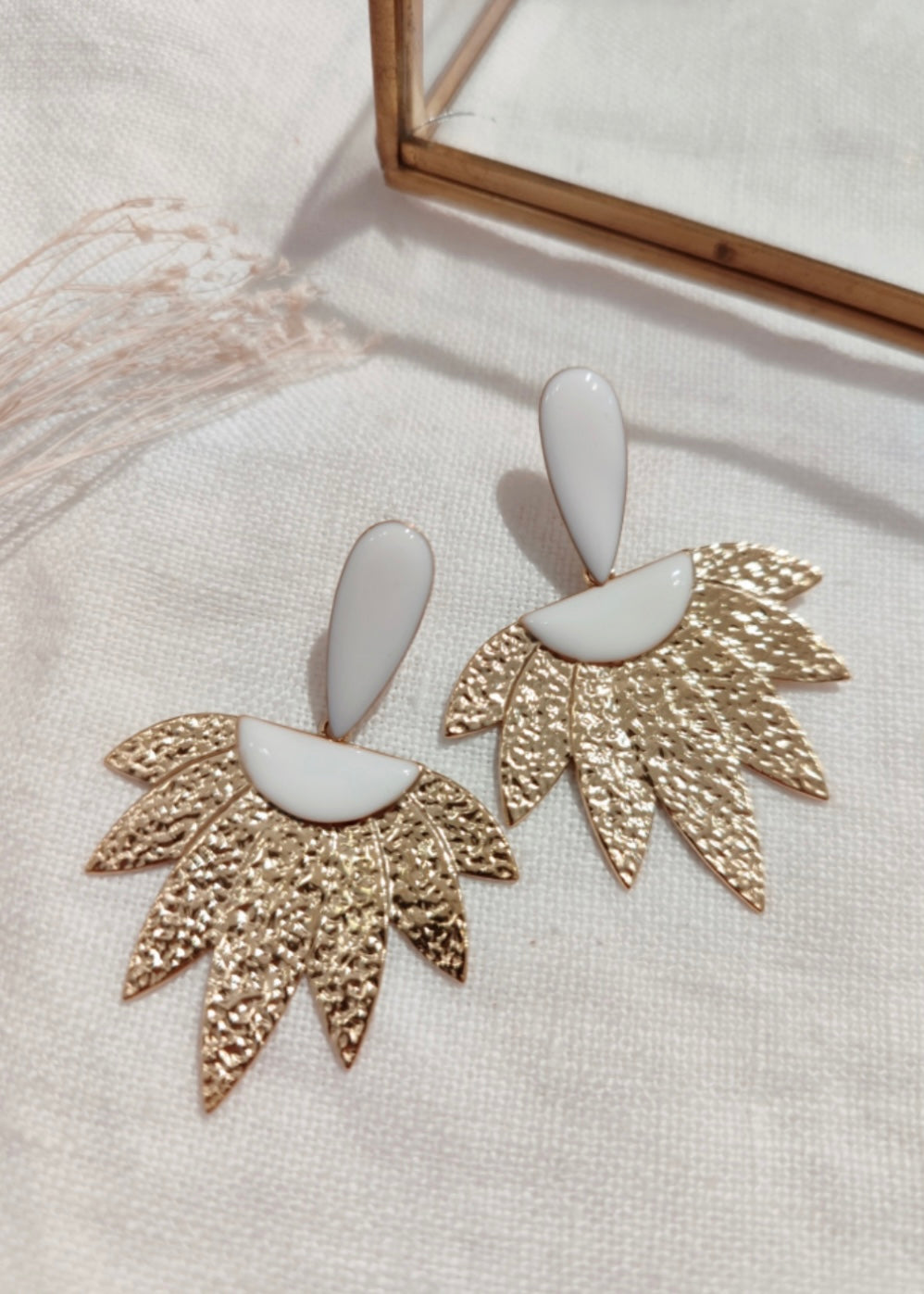 Boucles d’oreilles Blanches
